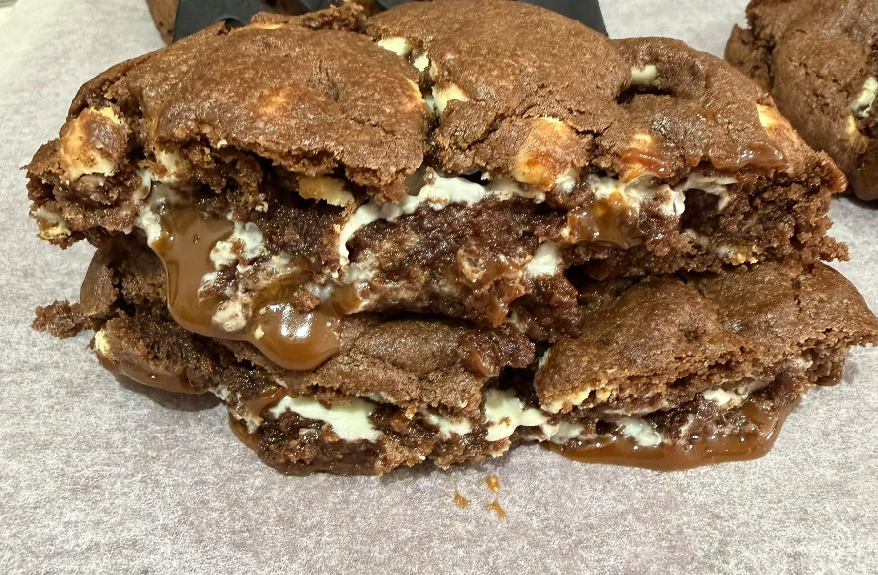 Thick chocolate cookies with a caramel-filled centre.
